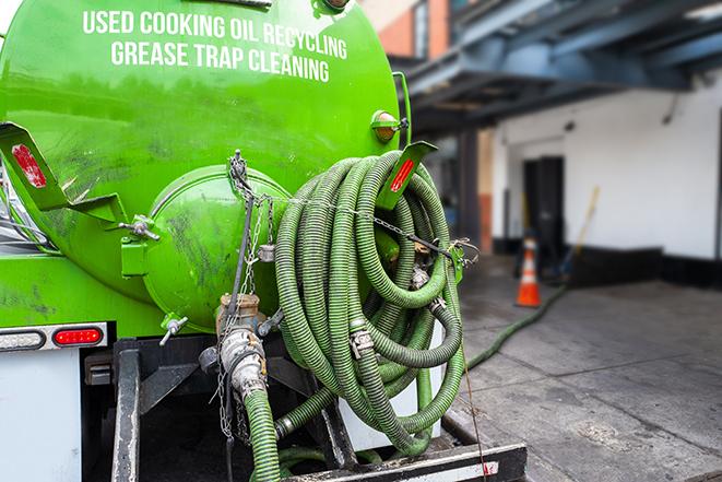 grease trap being pumped at a restaurant kitchen in Ashton